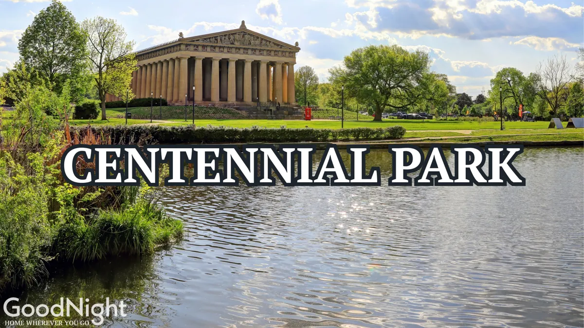 A tranquil park scene showcases a Parthenon-like structure reflected on calm water, surrounded by lush greenery and walking paths. The atmosphere is serene, inviting guests to enjoy outdoor strolls, jogs, or scenic views, echoing the nearby Sylvan Park walking trails mentioned in the section.