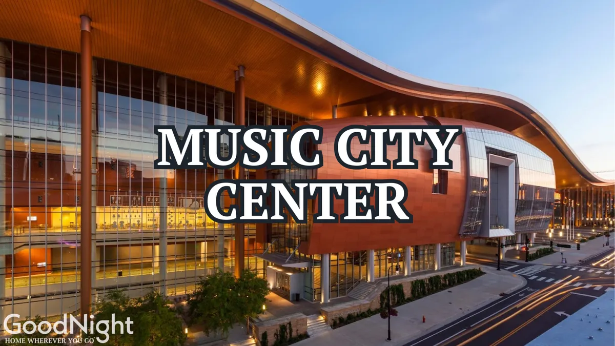 The striking facade of Nashville's Music City Center, featuring its iconic curved roof and expansive glass windows, set against a bustling city backdrop. The area is lively and modern, reflecting its function as a hub for events, conferences, and networking.